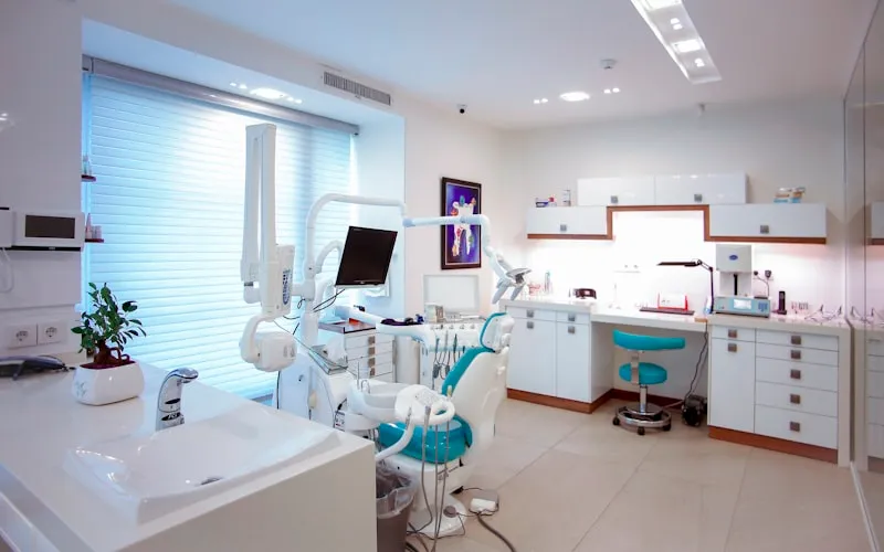 Warm, welcoming dental office interior with modern equipment and comfortable seating
