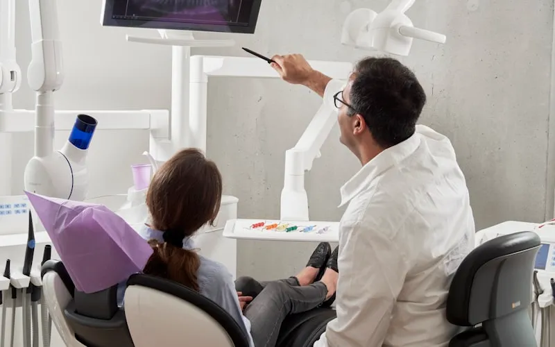 Dentist performing a thorough dental checkup and oral examination