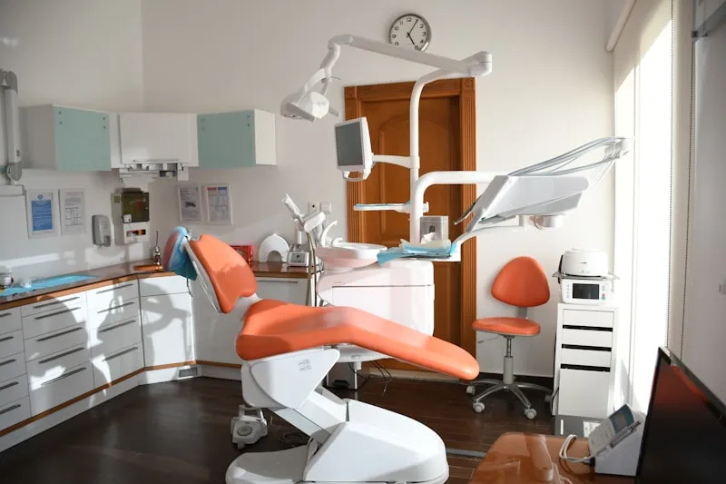 Patient receiving professional Zoom teeth whitening treatment at a dental office