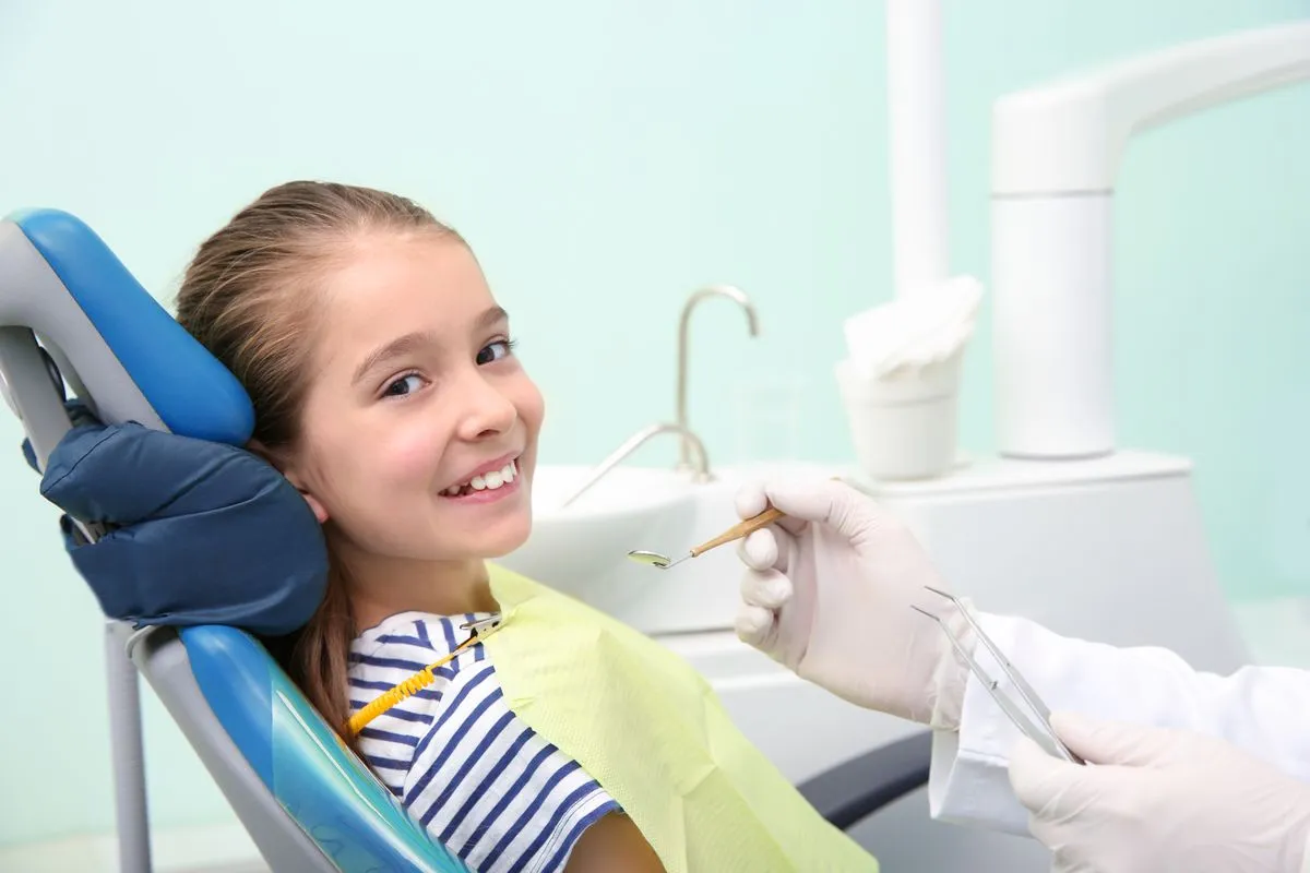 Child having a positive and comfortable dental visit for preventive care