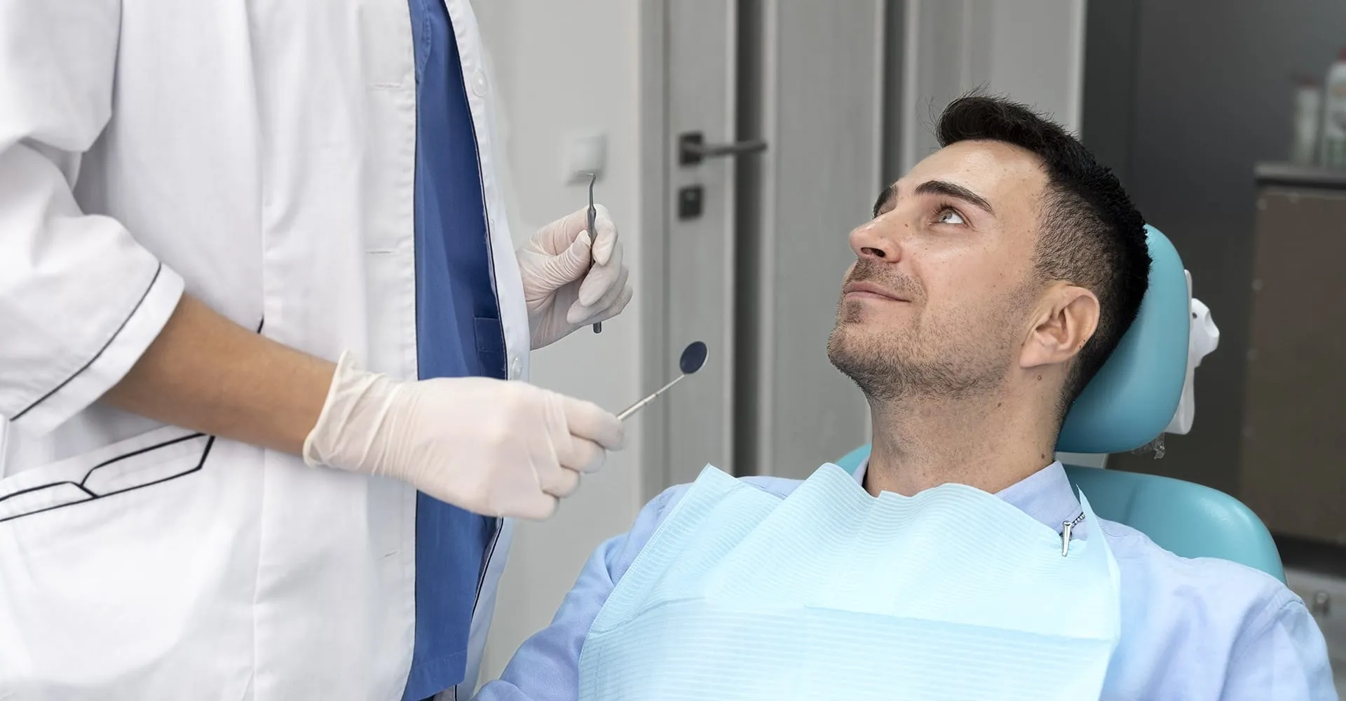 Patient receiving cosmetic dental treatment at HB Dentist